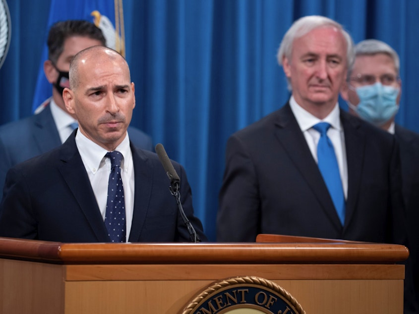 caption: Acting U.S. Attorney for the District of Columbia Michael Sherwin (left) is overseeing the massive criminal investigation of Wednesday's assault on the U.S. Capitol.