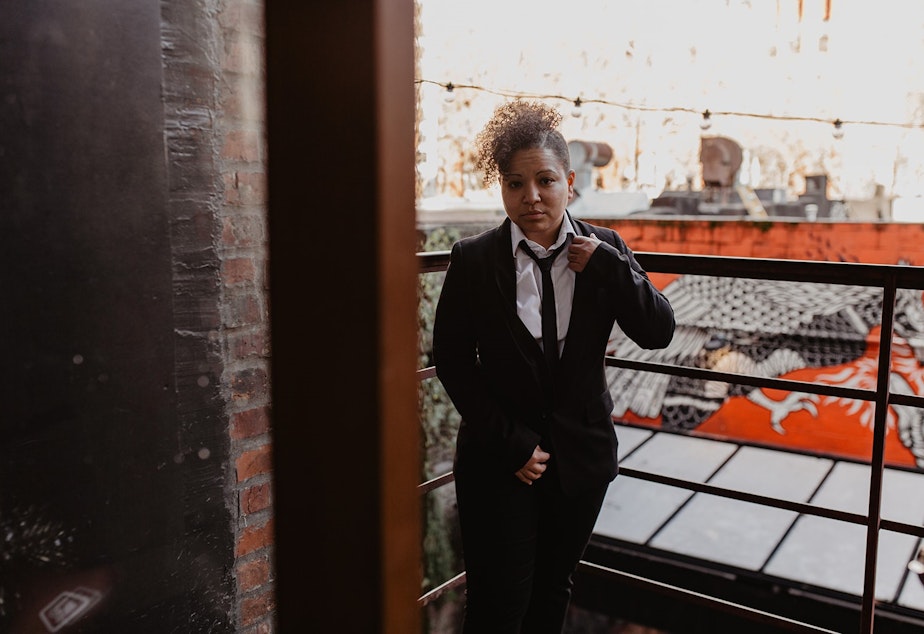 caption: Mellina White, the blogger behind The Seattle Conservative, poses for a photo in Seattle on February 17, 2020.
