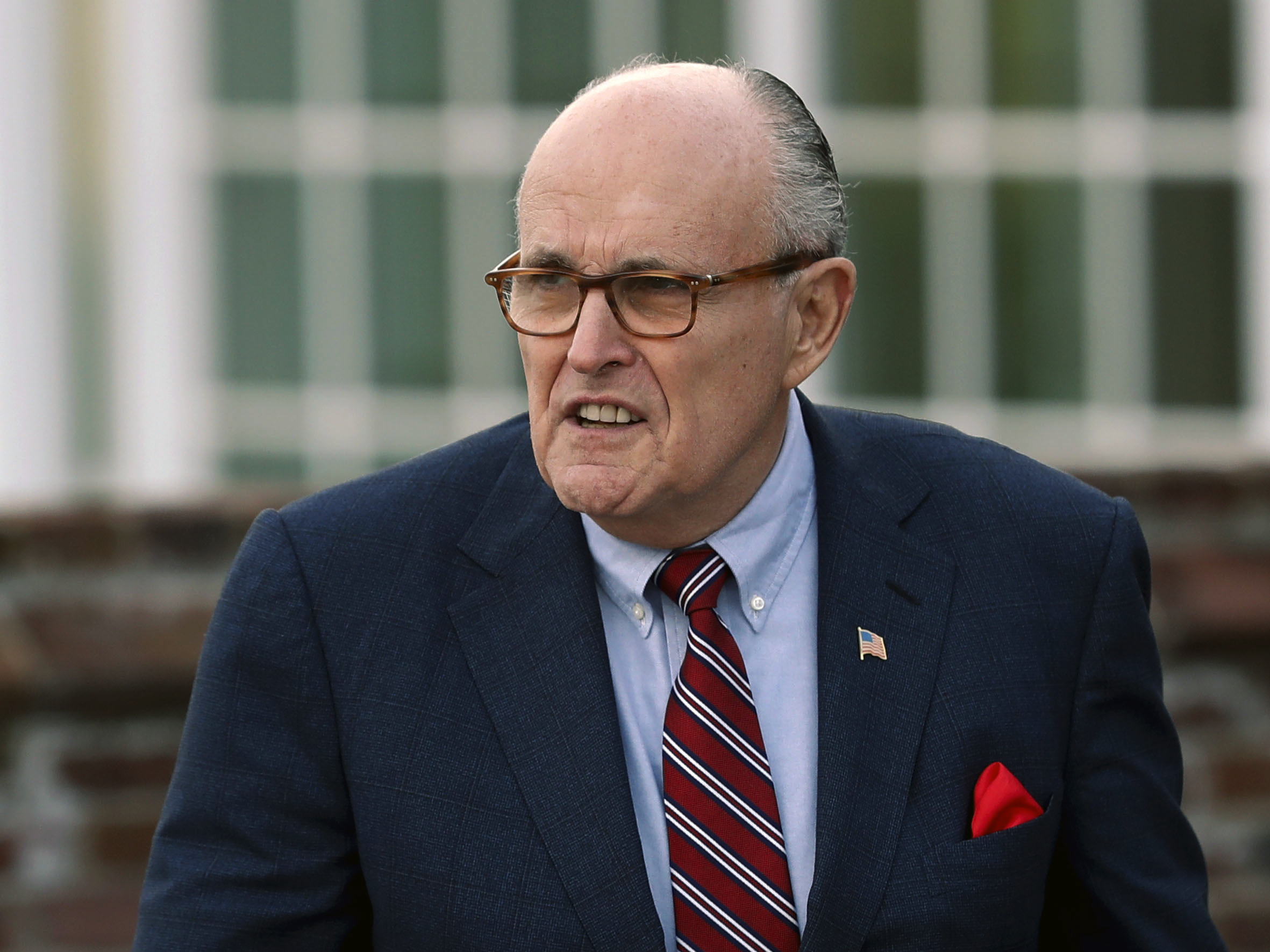 caption: Associates of President Trump's personal lawyer Rudy Giuliani, pictured in May 2018, have been arrested on campaign finance charges.