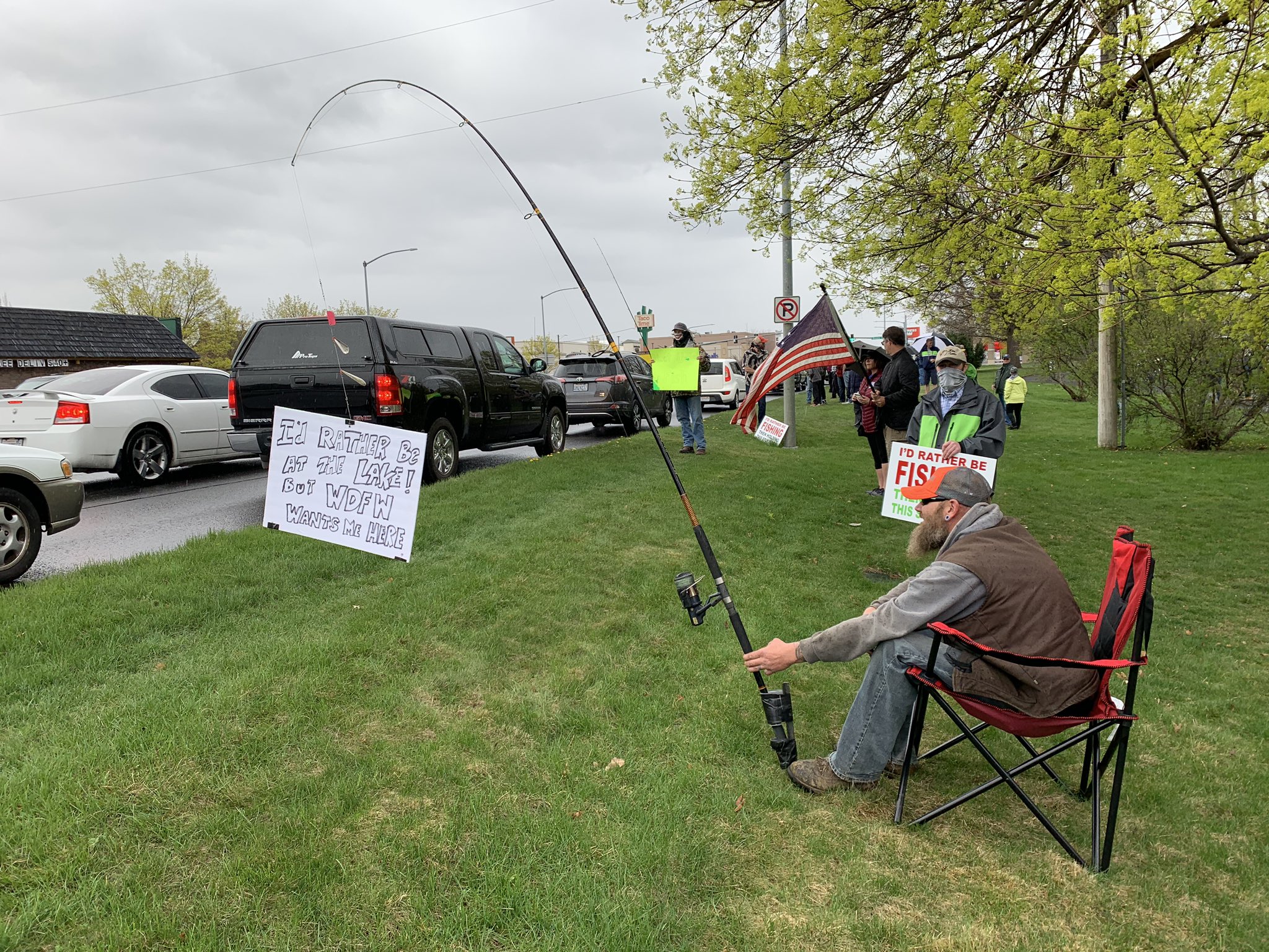 caption: Demonstrators in Spokane's Franklin Park April 22 said they wanted to fish, saying it's one of the most socially distant and isolating activities possible.