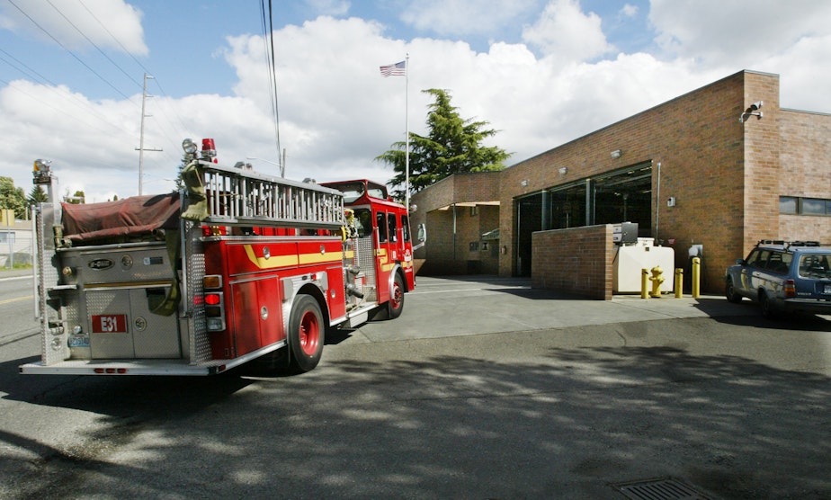 caption: FILE - A fire truck pulls into the Seattle Fire Dept.'s Station 31 following a call Friday, April 16, 2004, in Seattle.