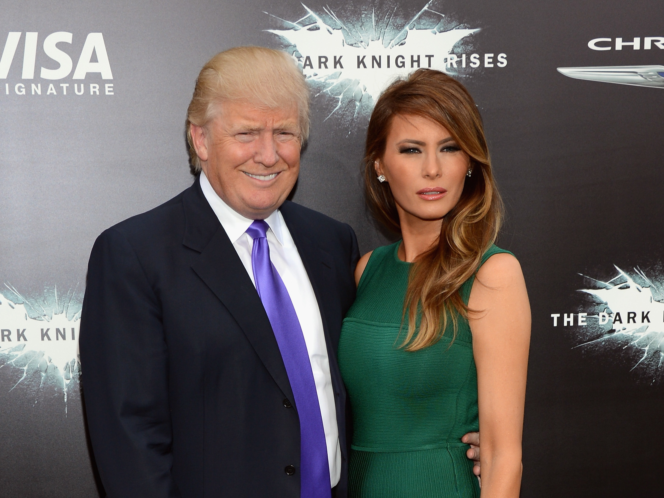 caption: President Trump tweeted a video promoting his campaign that used music from the Batman movie <em>The Dark Knight Rises </em>without permission. Trump and first lady Melania Trump are seen here at a premiere of the film in 2012.