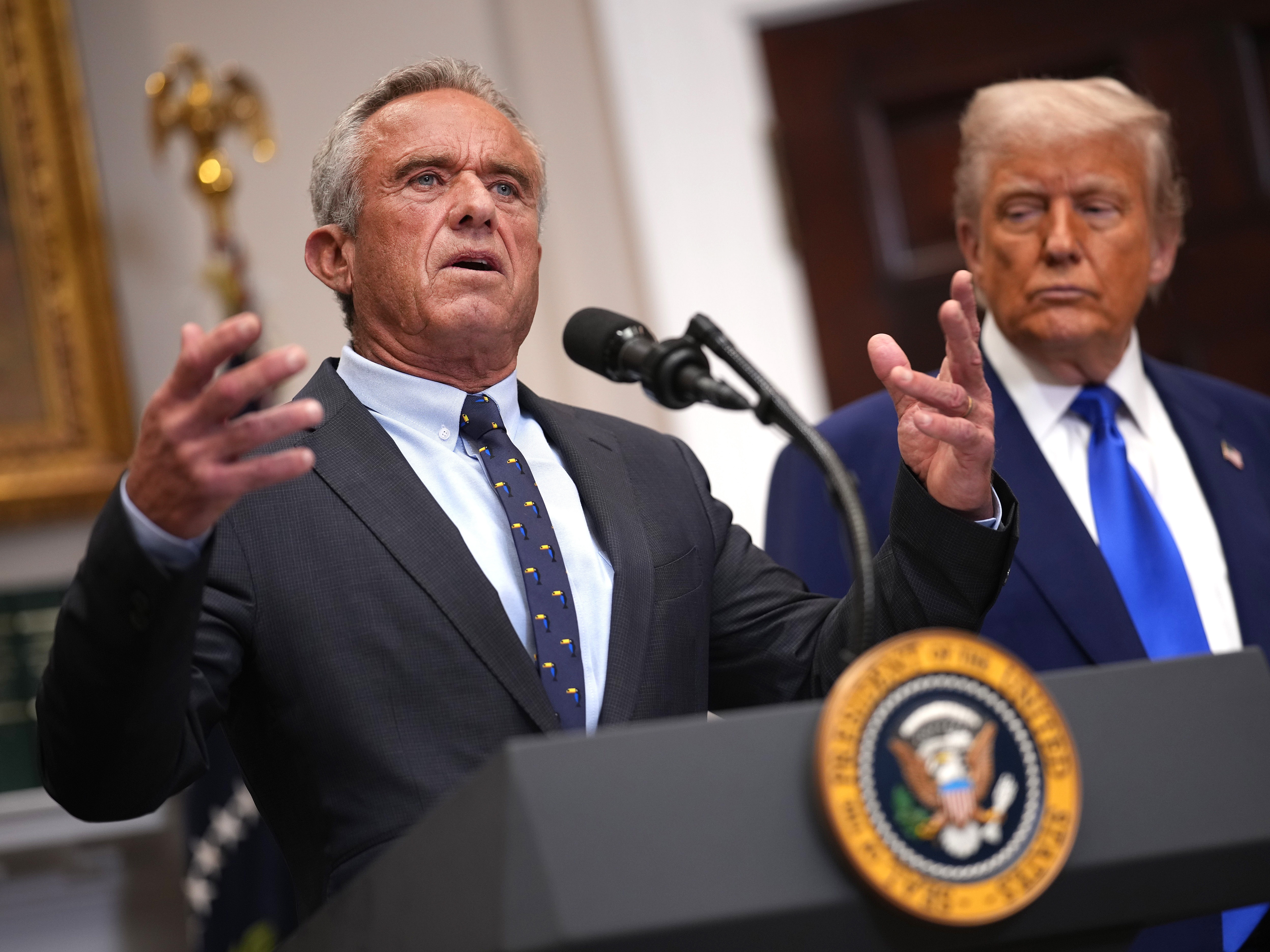 caption: Health and Human Services Secretary Robert F. Kennedy Jr. has been carrying out President  Trump's vision to shrink government. On Monday, they announced an executive order aimed at drug prices.