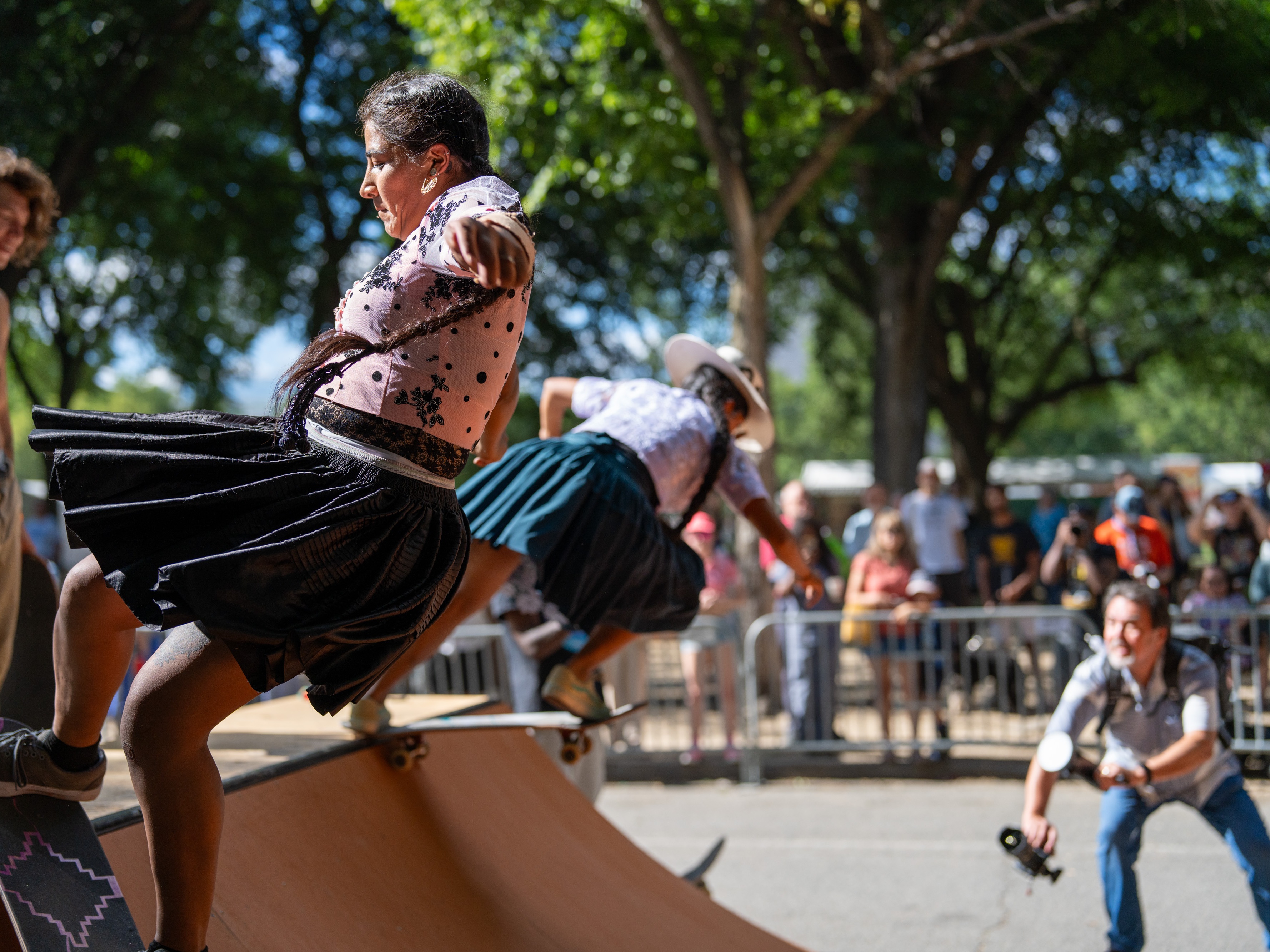 caption: Bolivian skateboarders show off their moves at the Smithsonian Folklife Festival in Washington, D.C., in June. In addition to doing demos, they taught skateboard basics to kids as young as 3.