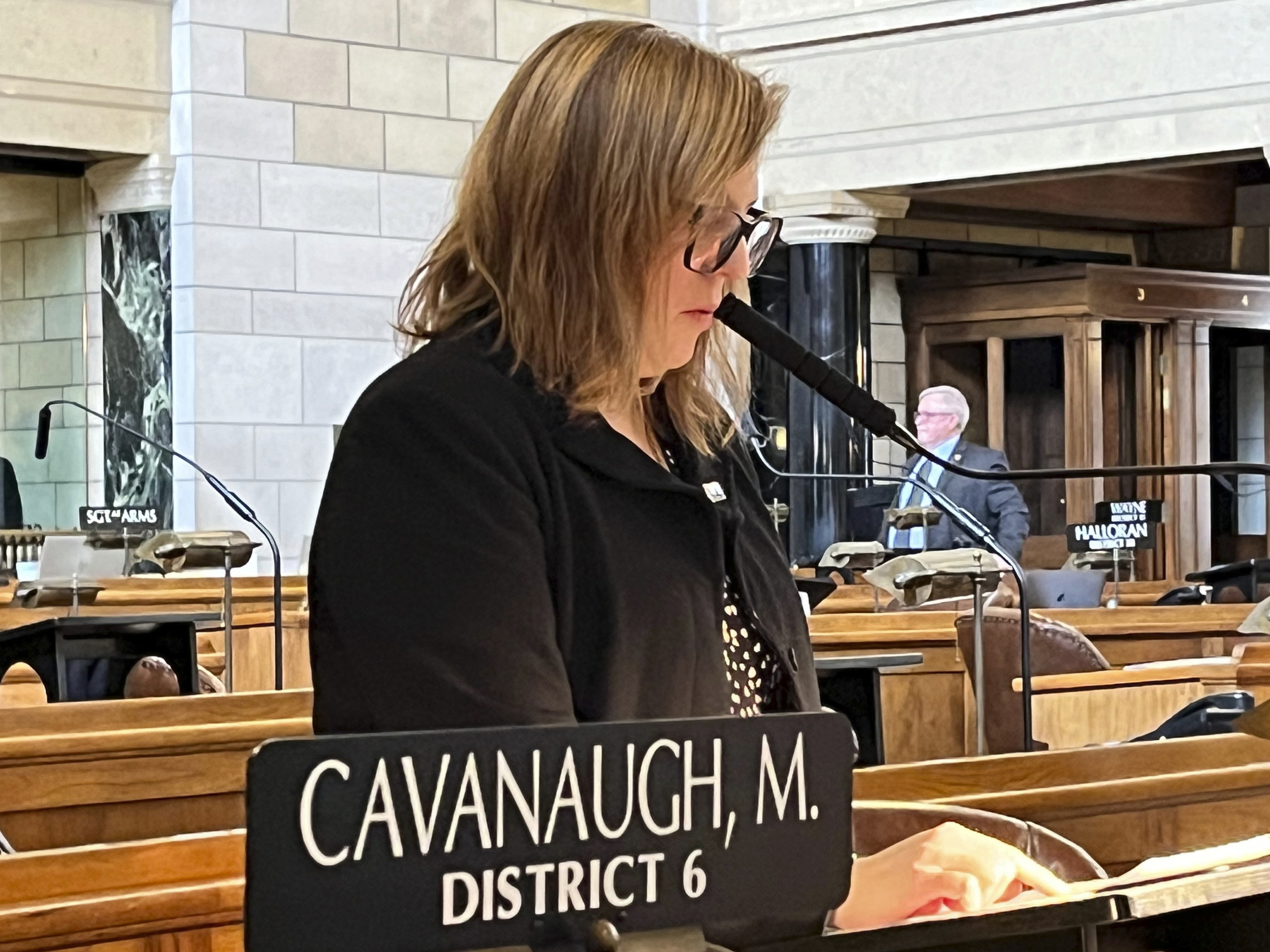 caption: State Sen. Machaela Cavanaugh speaks before the Nebraska Legislature in March as part of an effort to filibuster every bill that comes before the legislature this session.