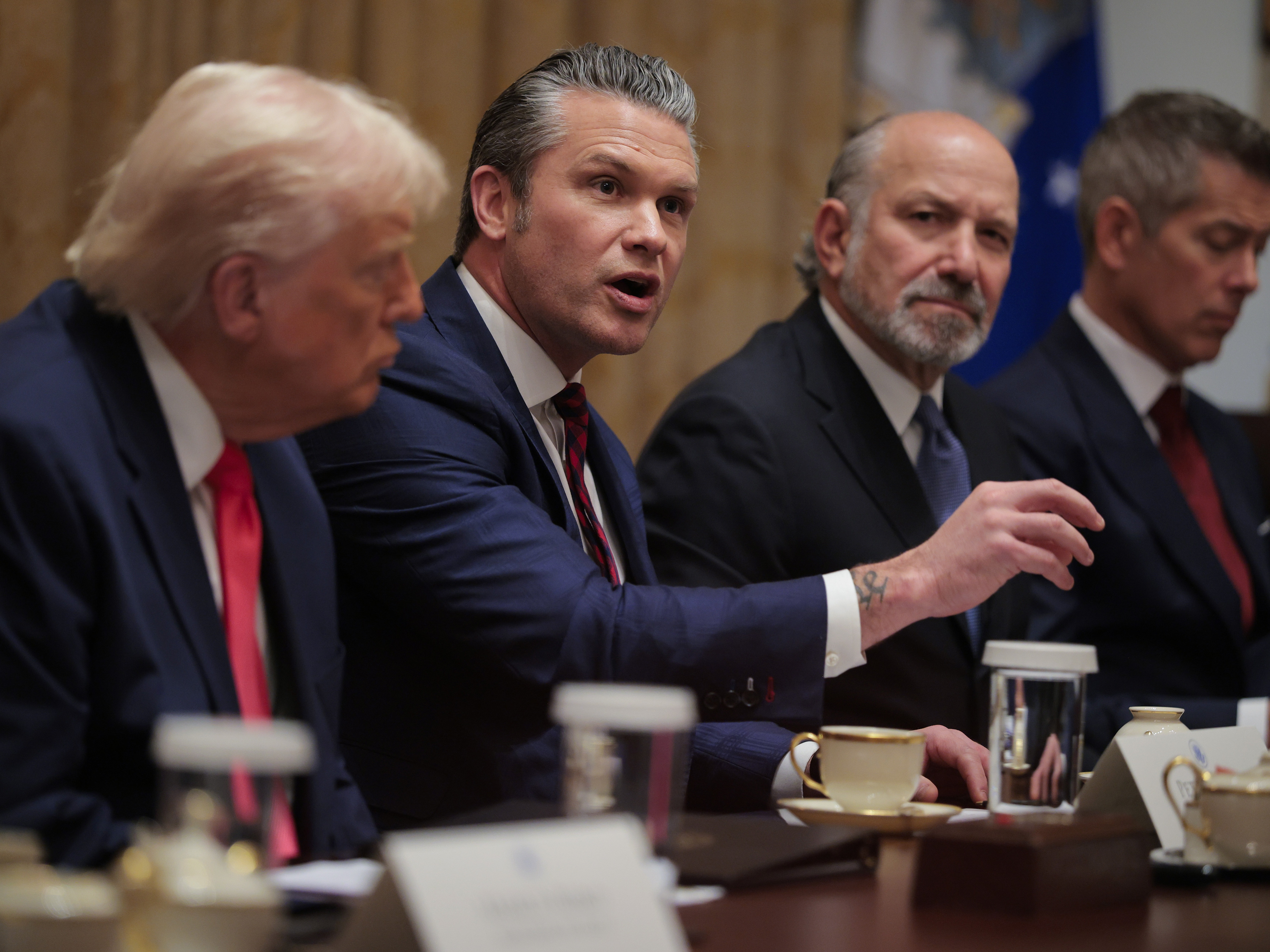 caption: Defense Secretary Pete Hegseth speaks during a Cabinet meeting in the Cabinet Room at the White House on Tuesday.