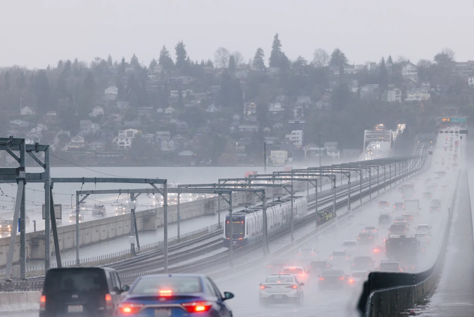 caption: A Crosslake Connection train crosses I-90 linking Seattle and Bellevue during a practice run in December of 2025 (before the line opened to the public).