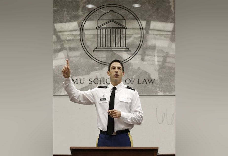 caption: Military prosecutor U.S. Army Lt. Col. Jay Morse speaks to a law school class in November 2013. Morse has been accused of sexual assault from an incident in 2011.