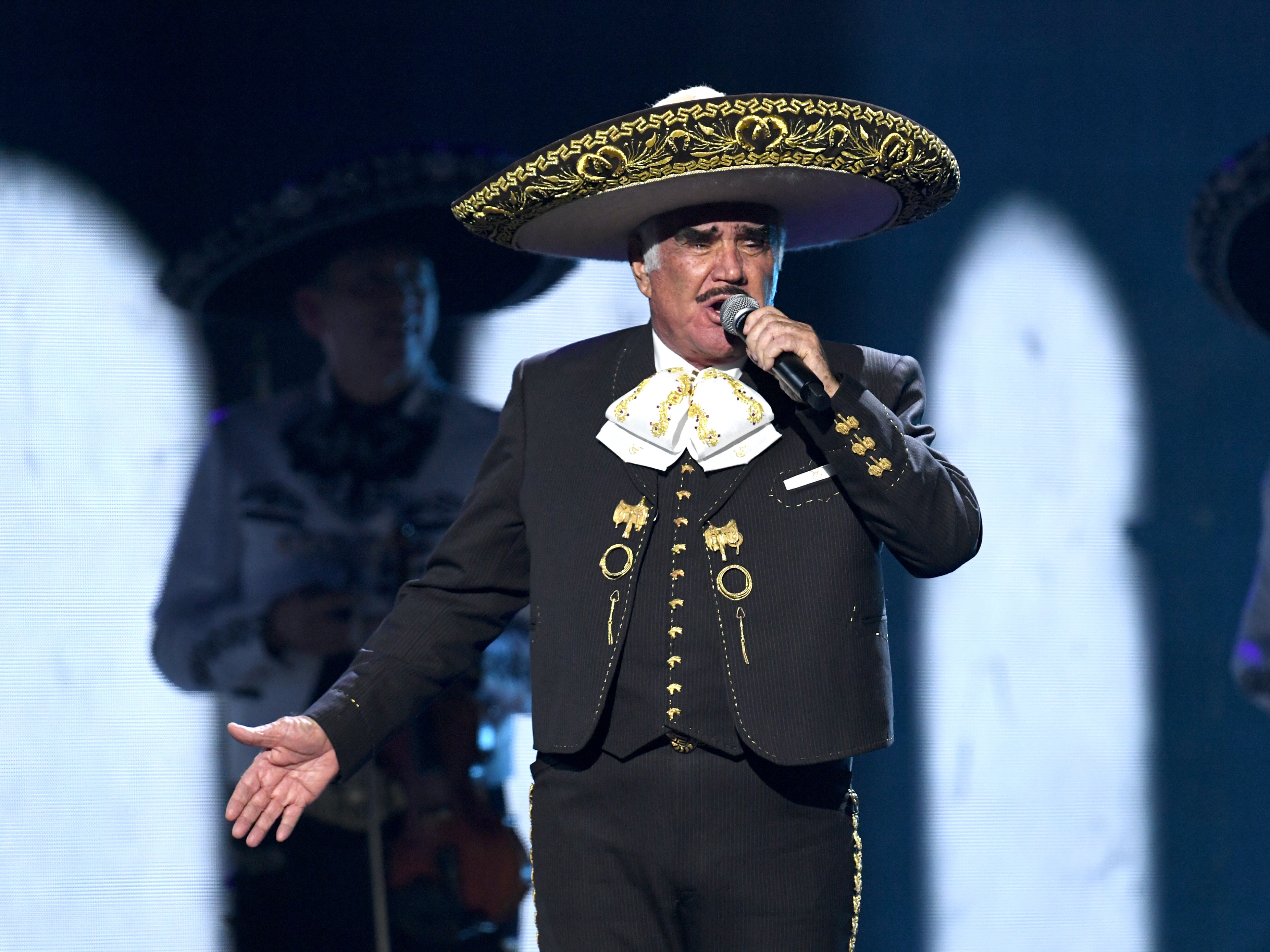 caption: Vicente Fernández performs onstage during the 20th annual Latin Grammy Awards in 2019.