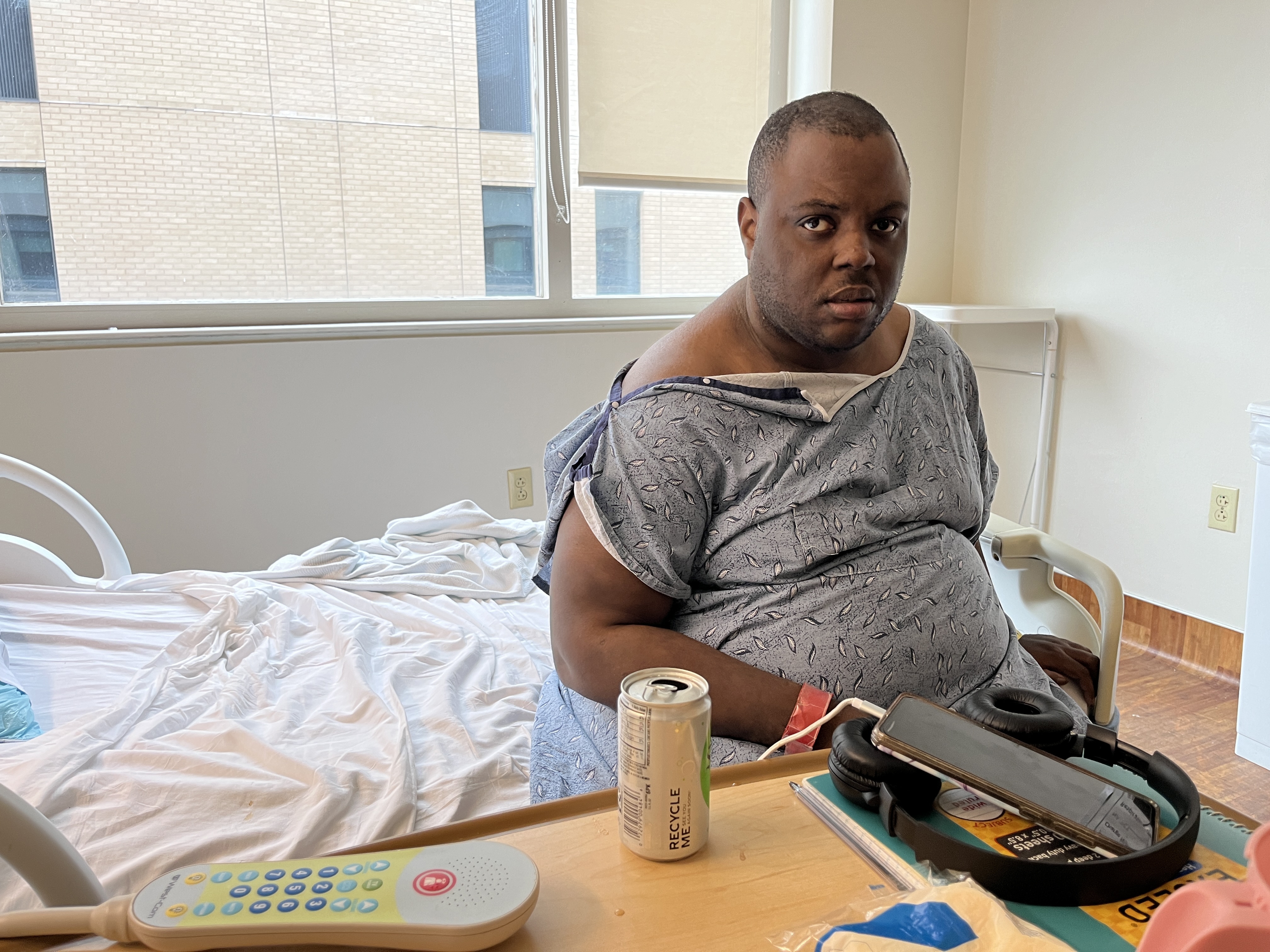 caption: Lloyd Mills, who has autism, cerebral palsy and mental illness, has the legal right to be housed in a community setting with the supports he needs. But Georgia, like other states, has critical holes in its system meant to support people with disabilities.