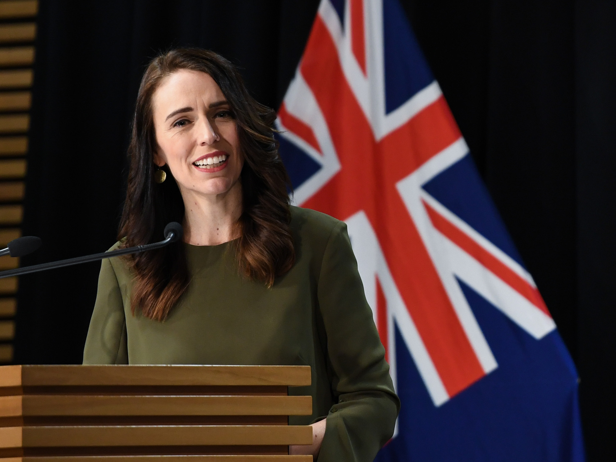 caption: "I don't think there's any comparison between New Zealand's current cluster and the tens of thousands of cases that are being seen daily in the United States," New Zealand Prime Minister Jacinda Ardern said on Tuesday.