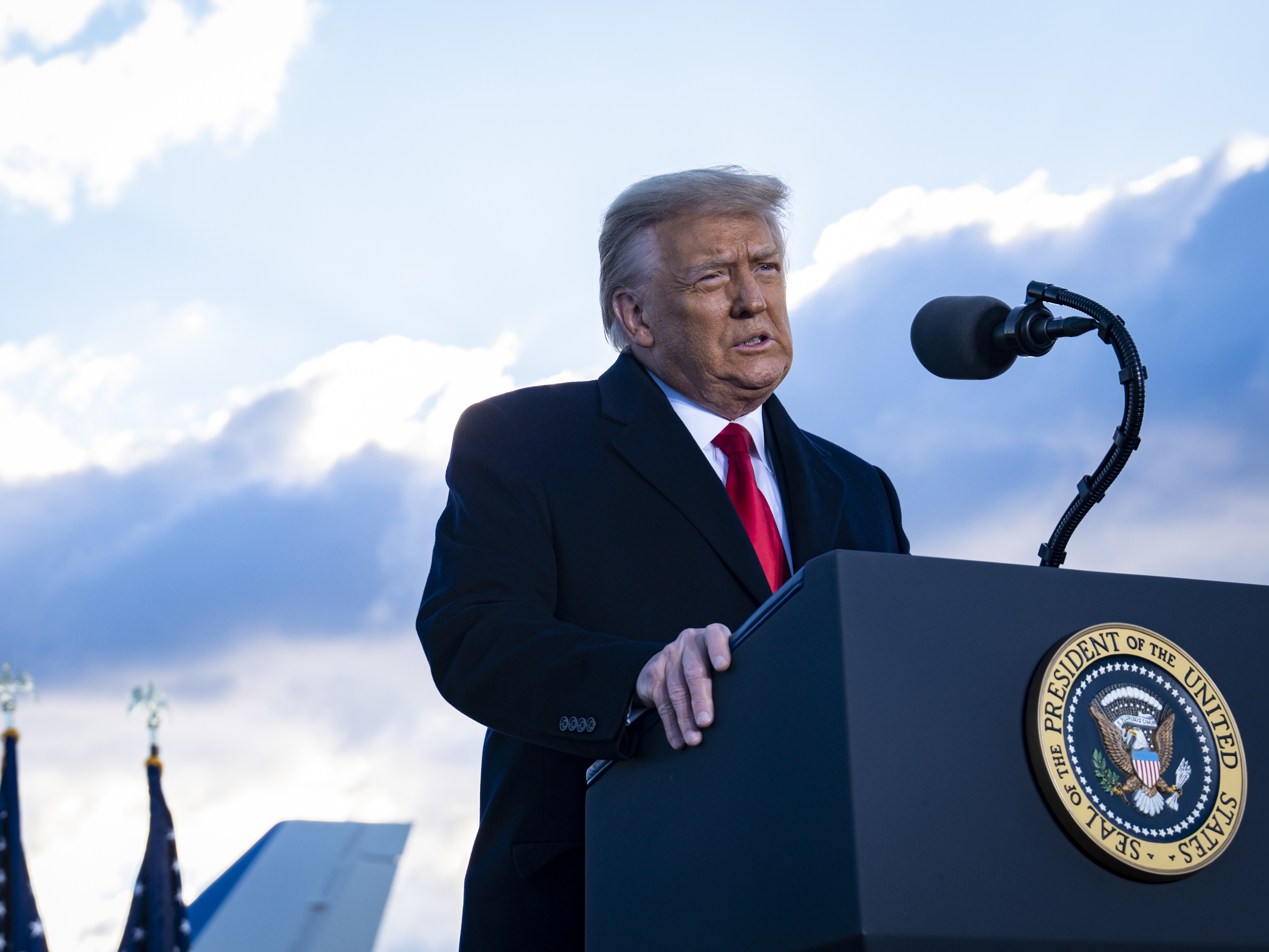caption: Former President Trump speaks to supporters on his last day in office on Jan. 20, 2021.