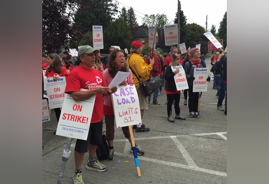 caption: At Roosevelt High School, teachers sang along to union anthems, led by the Seattle Labor Chorus on Monday, Sept. 14 -- day four of the strike.