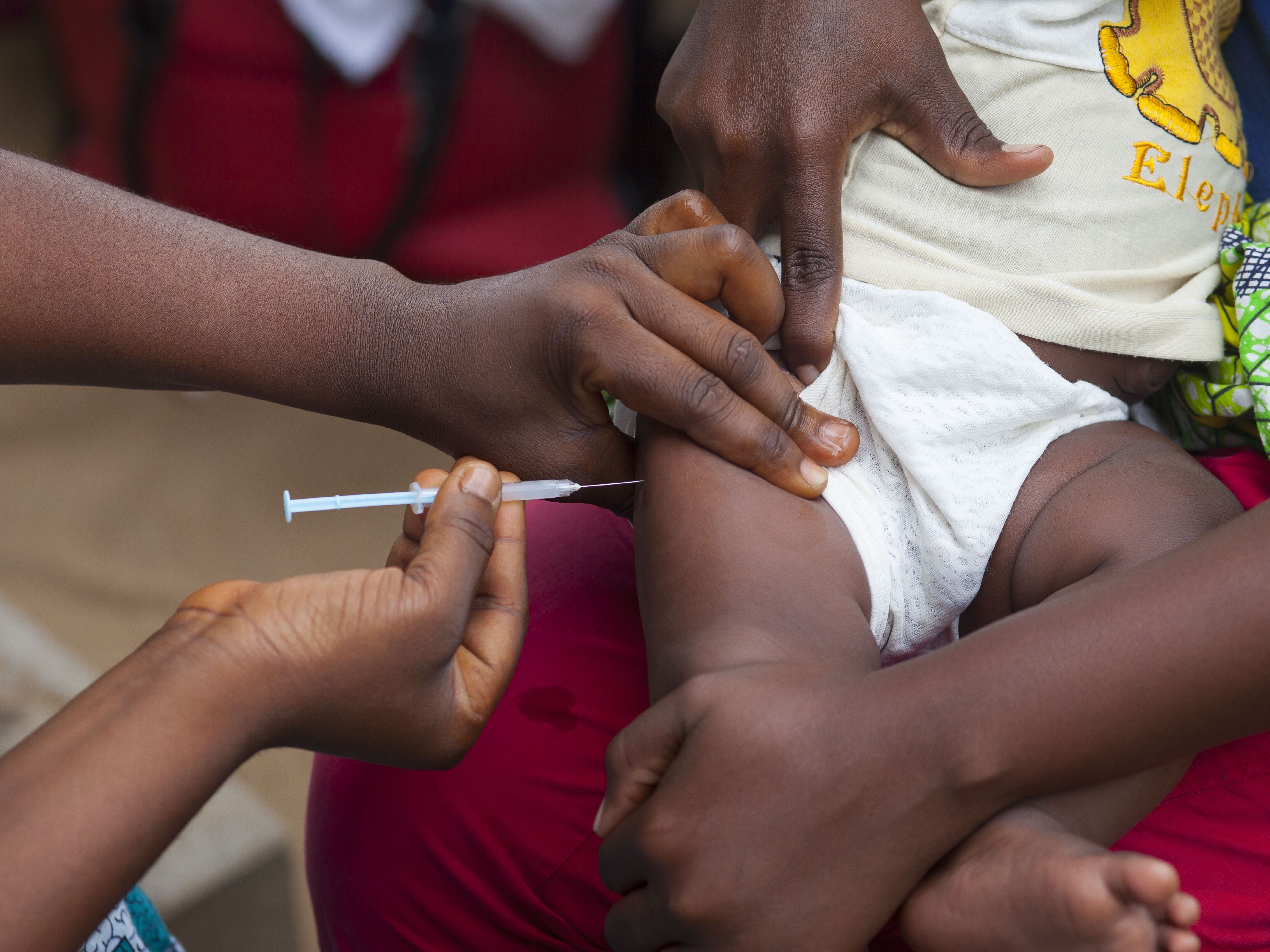 caption: The first dose of the hepatitis B vaccine is delivered to newborns for maximum protection. The U.S. has taken the vaccine off its list of recommended vaccines while other countries are racing to secure the life-saving vaccine vials.