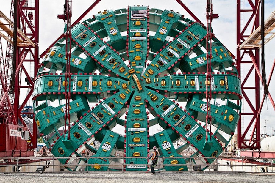 caption: Bertha, the drilling machine digging out the SR 99 tunnel, has run up against an unknown impediment. 