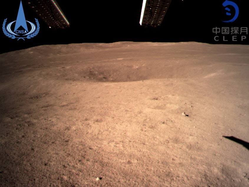 caption: This photo, provided by China National Space Administration via Xinhua News Agency, is the first image of the moon's far side ever taken from the surface. A Chinese spacecraft on Thursday made the first-ever landing on the far side of the moon, state media said.