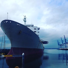 caption: A ship moored at the Port of Tacoma not far from the proposed site of the largest methanol plant in the world.
