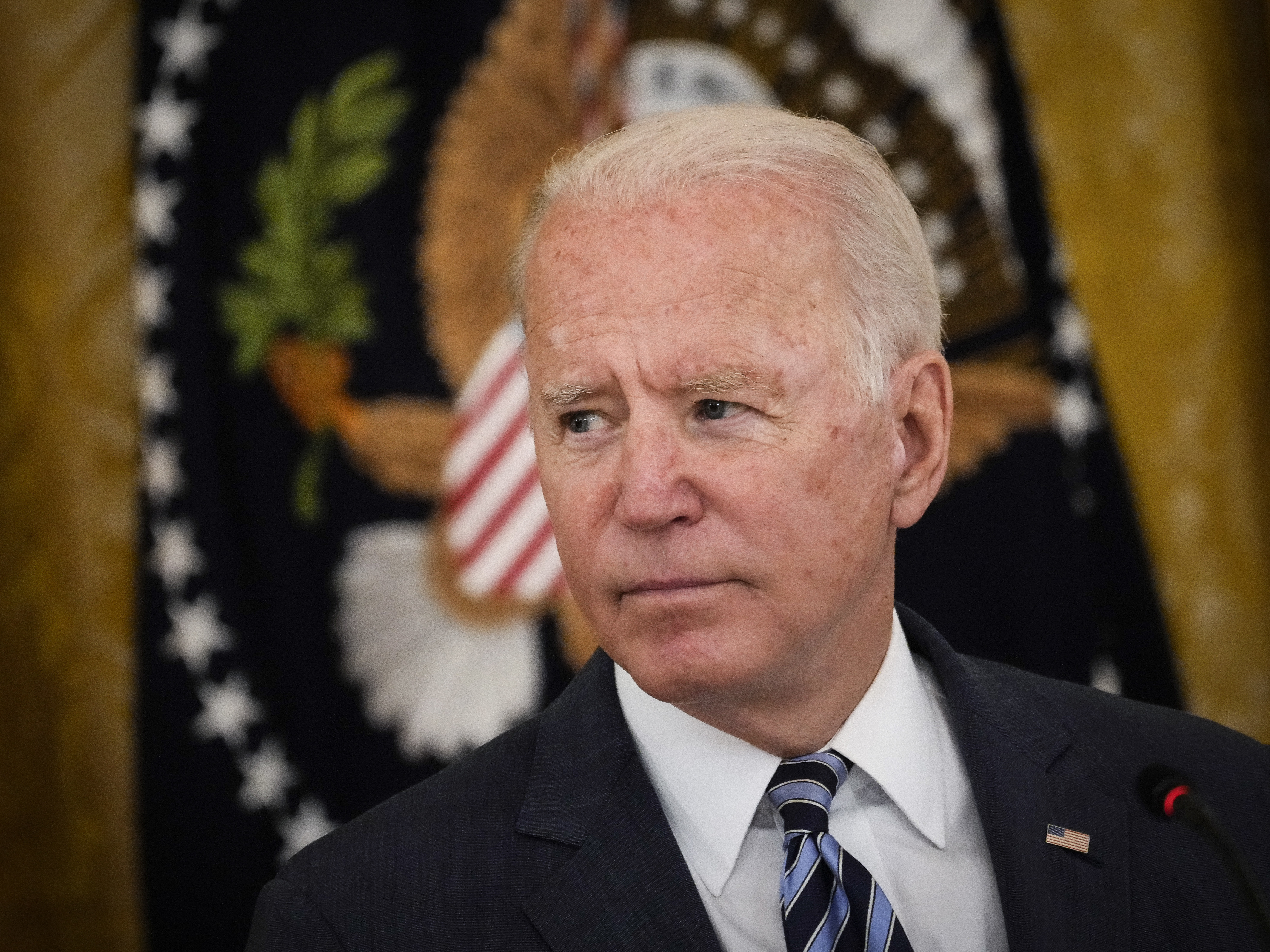 caption: President Biden, seen here at the White House on Aug. 25, is set to deliver remarks Thursday, following two explosions in Afghanistan that injured more than 150 people and left 12 U.S. troops dead.