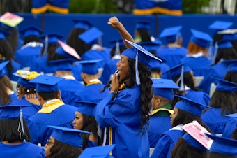 caption: Graduates attend Tennessee State University's commencement ceremony in Nashville on May 7, 2022. Under a new repayment plan, millions of student loan borrowers will see their monthly repayment amounts cut in half or more.
