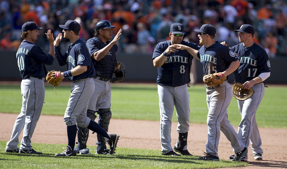 caption: Seattle Mariners play at the Baltimore Orioles in 2013.