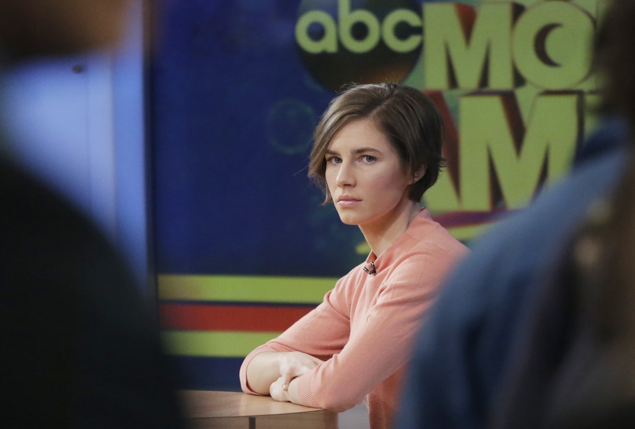 caption: Amanda Knox waits on a television set for an interview, Friday, Jan. 31, 2014 in New York. 