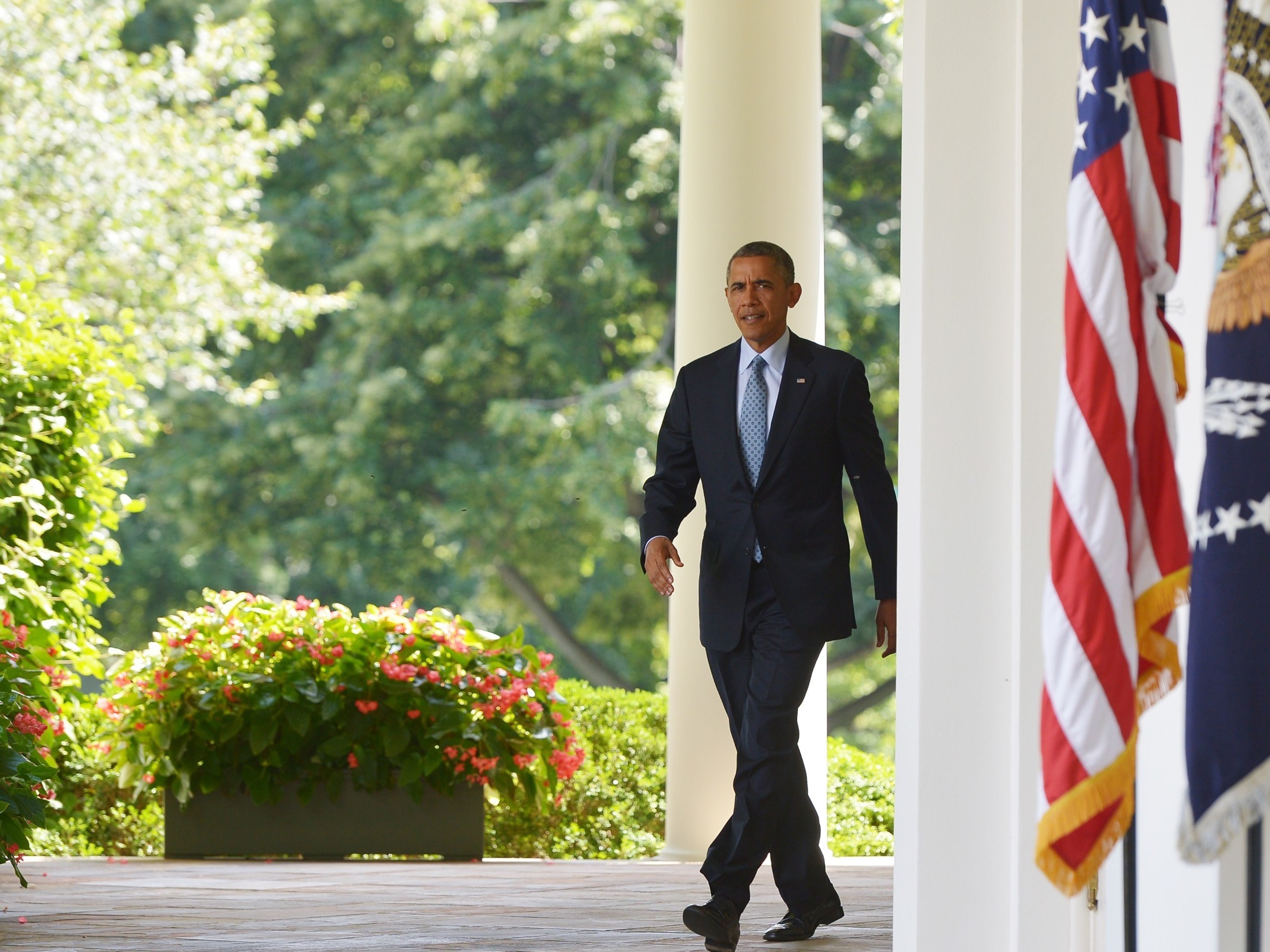 caption: President Obama spoke on immigration at the  Rose Garden at the White House on June 30, 2014.