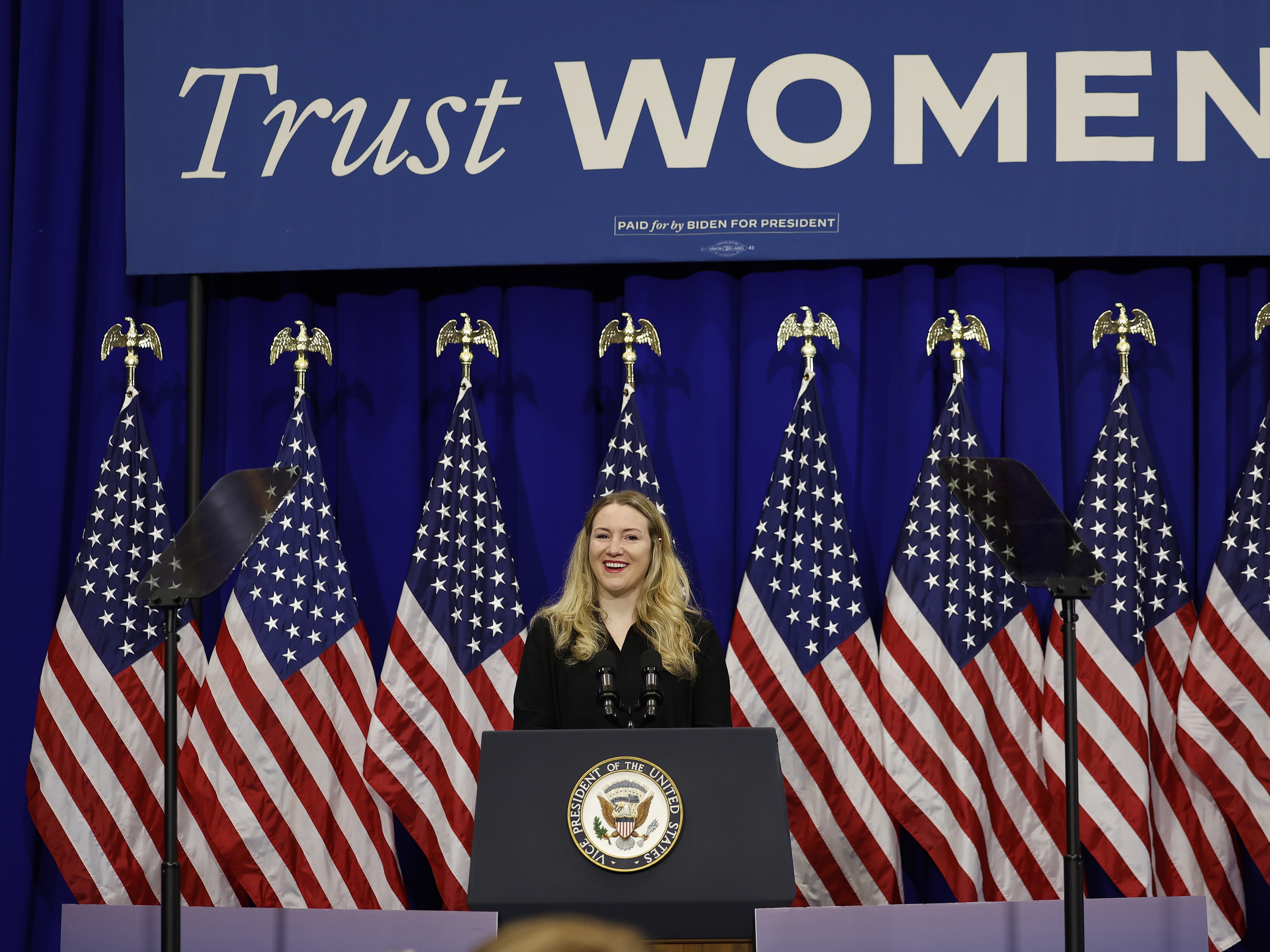 caption: Kate Cox introduces U.S. Vice President Kamala Harris, at an event on reproductive rights on June 24, 2024 in College Park, Maryland.
