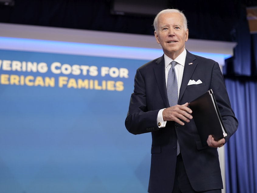 caption: President Joe Biden listens to a reporters question after speaking about the economy at the Eisenhower Executive Office Building on Thursday.