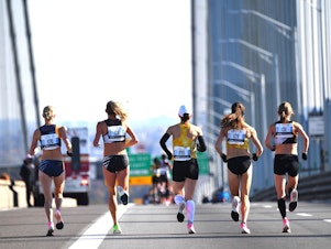 caption: A group of runners compete in the New York City Marathon in 2019. It's one of many big city races to return this year after they were cancelled over pandemic health restrictions in 2020.