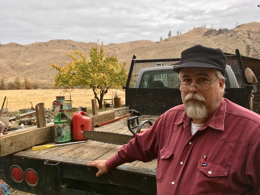 caption: Rancher Dave Creveling believes the cost of a new Washington state carbon fee would be passed along to rural people like him if voters approve it. CREDIT: ASHLEY AHEARN