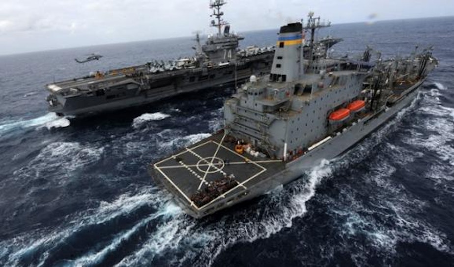 caption: The U.S. Navy's aircraft carrier USS John C. Stennis transits the Pacific Ocean alongside the oiler USNS Yukon.