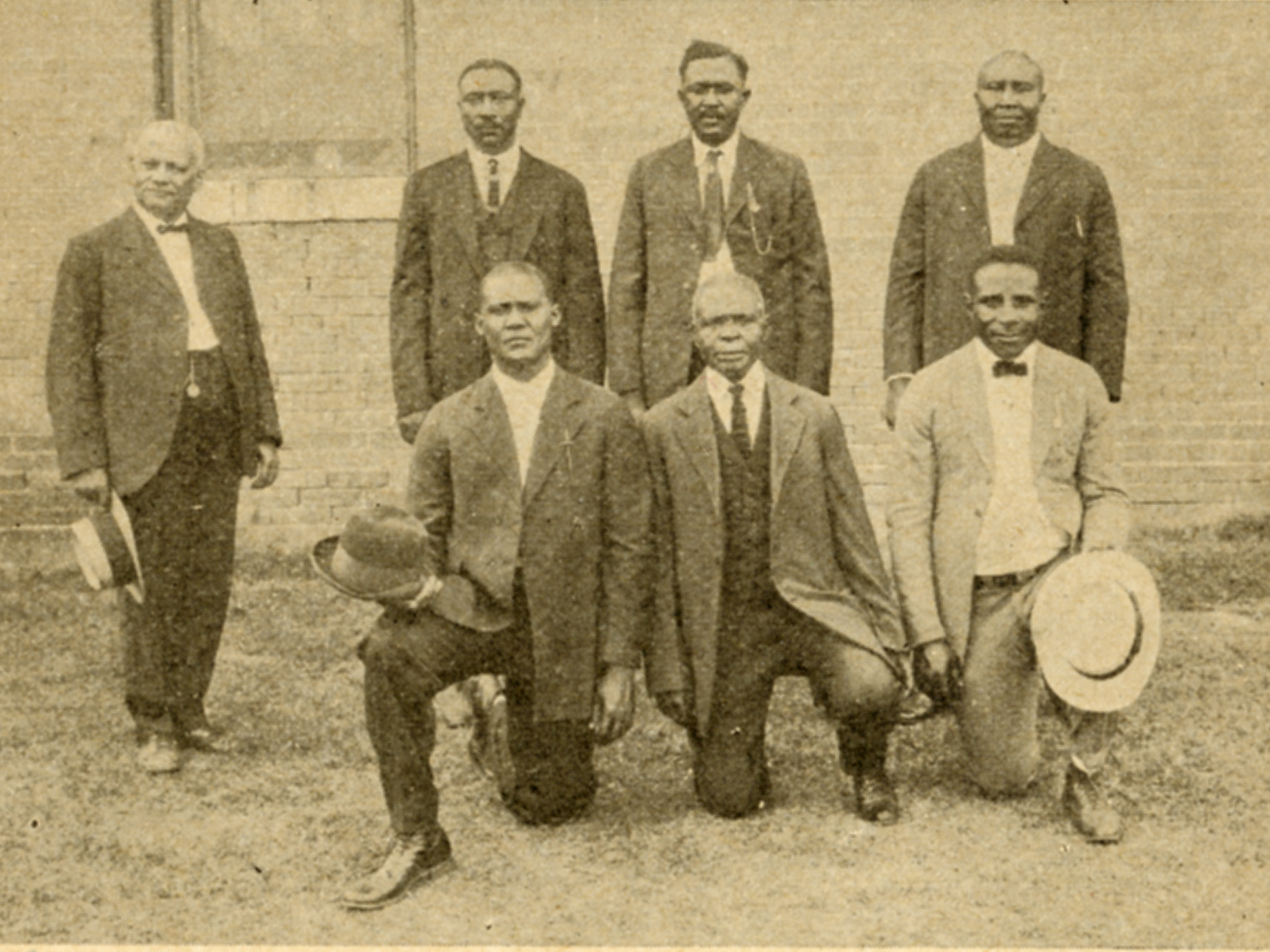 caption: A dozen Black men were convicted<strong> </strong>of murder<strong> </strong>by all-white juries in connection with the 1919 massacre in Elaine, Ark. Above, defendants S.A. Jones, Ed Hicks, Frank Hicks, Frank Moore, J.C. Knox, Ed Coleman and Paul Hall with their attorney at the state penitentiary in Little Rock in 1925 after the Supreme Court overturned their convictions.