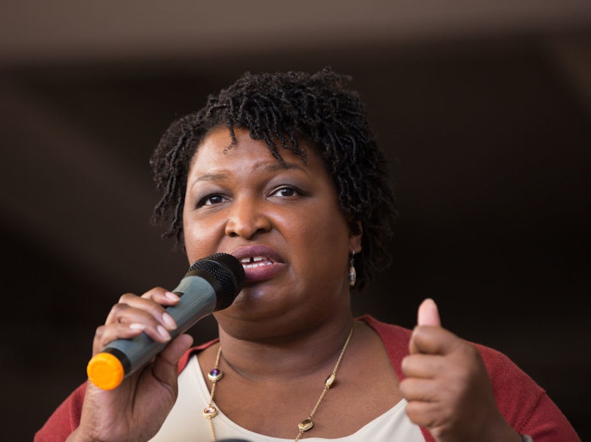 caption: Democrat Stacey Abrams isn't backing down from her fight against what she calls voter suppression tactics and election mismanagement after losing the Georgia governor's race.