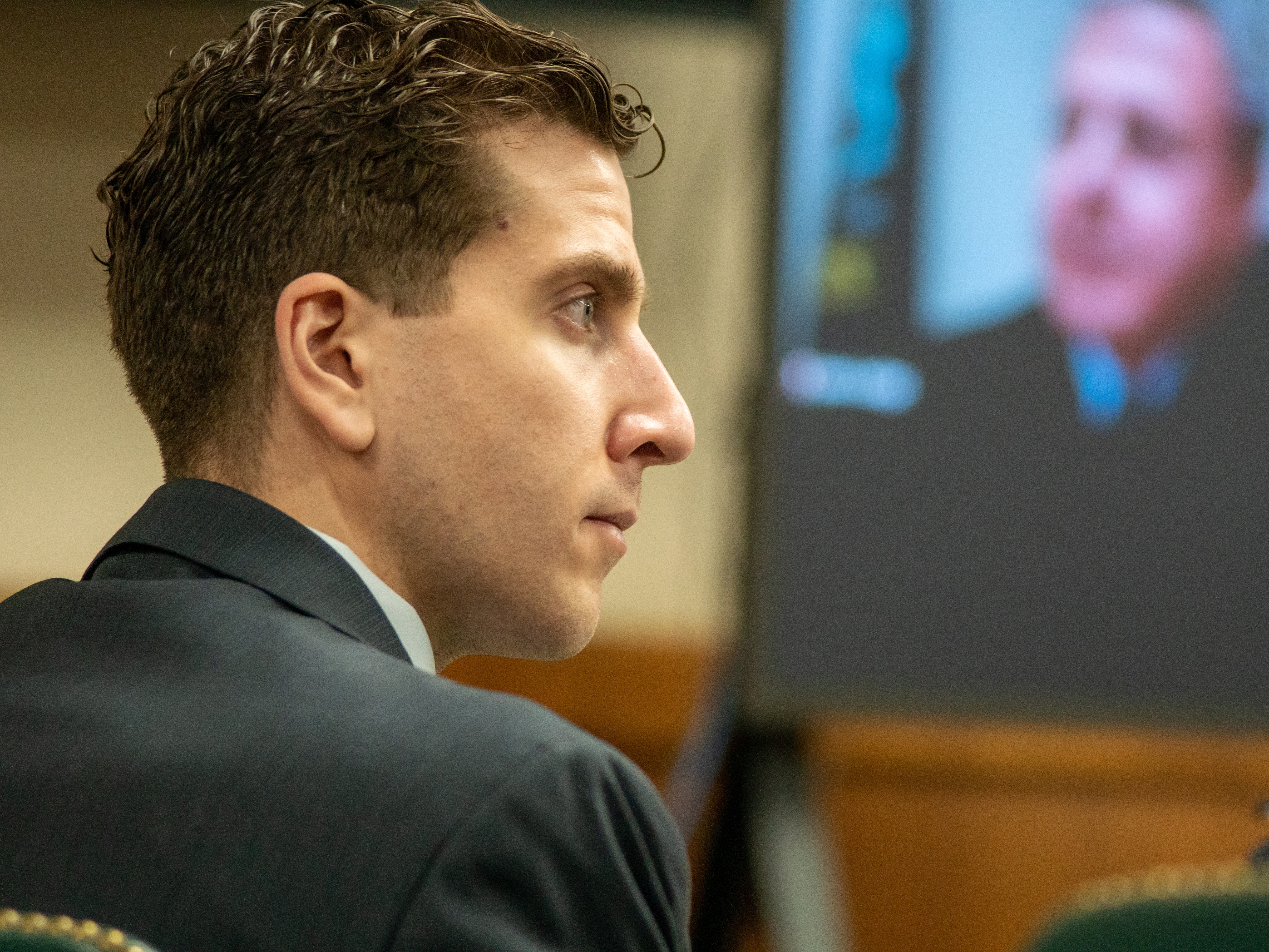 caption: Bryan Koberger listens during a hearing on Oct. 26, 2023, in Moscow, Idaho. Kohberger is poised to agree to a plea deal to avoid going to trial on multiple murder charges in the November 2022 killings of Madison Mogen, 21; Kaylee Goncalves, 21; Xana Kernodle, 20; and Ethan Chapin, 20.