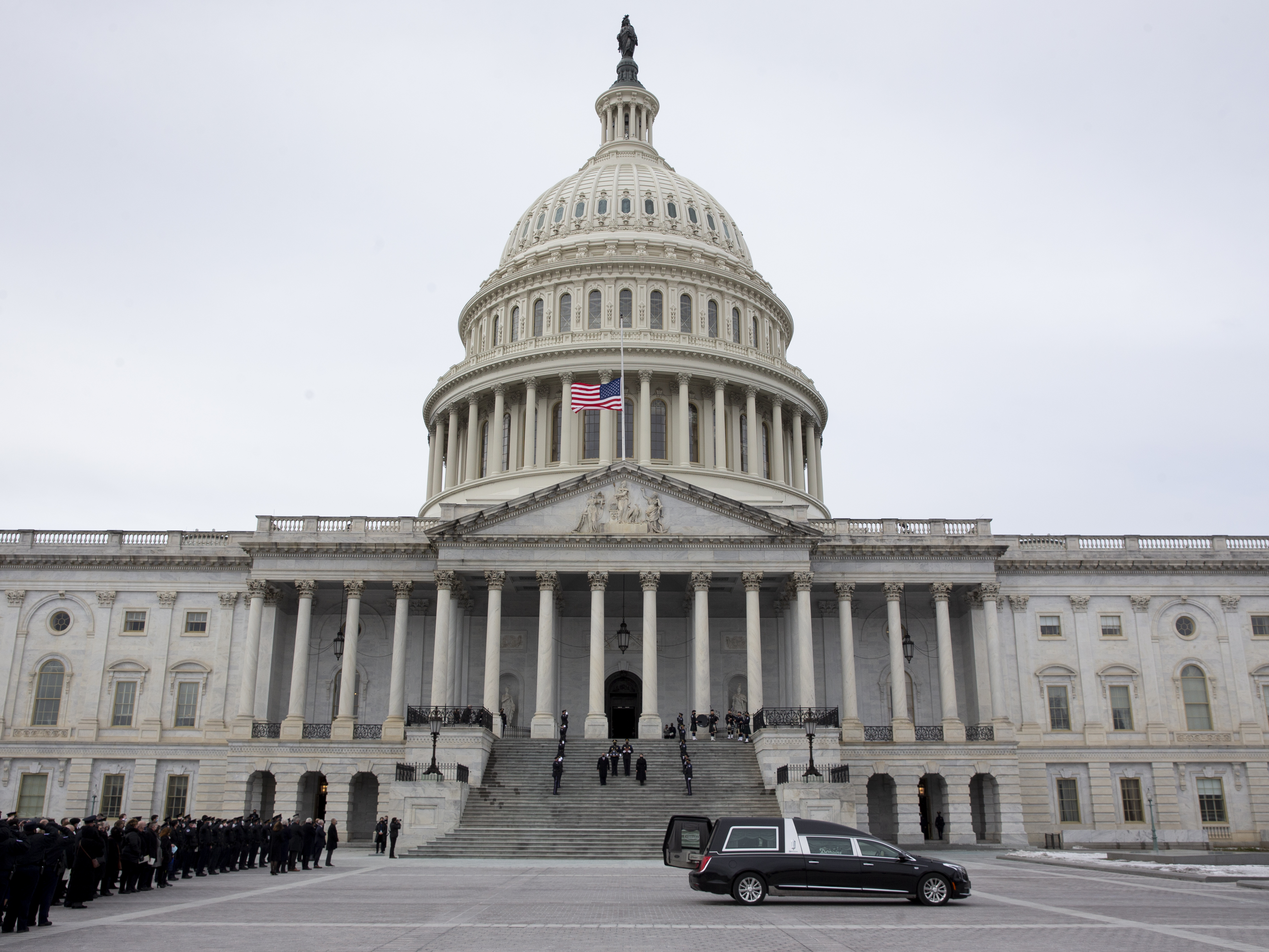 caption: The U.S. Capitol is seen earlier this week during ceremonies in honor of Capitol Police officer Brian Sicknick who suffered fatal injuries during the Jan. 6 attack on the building.