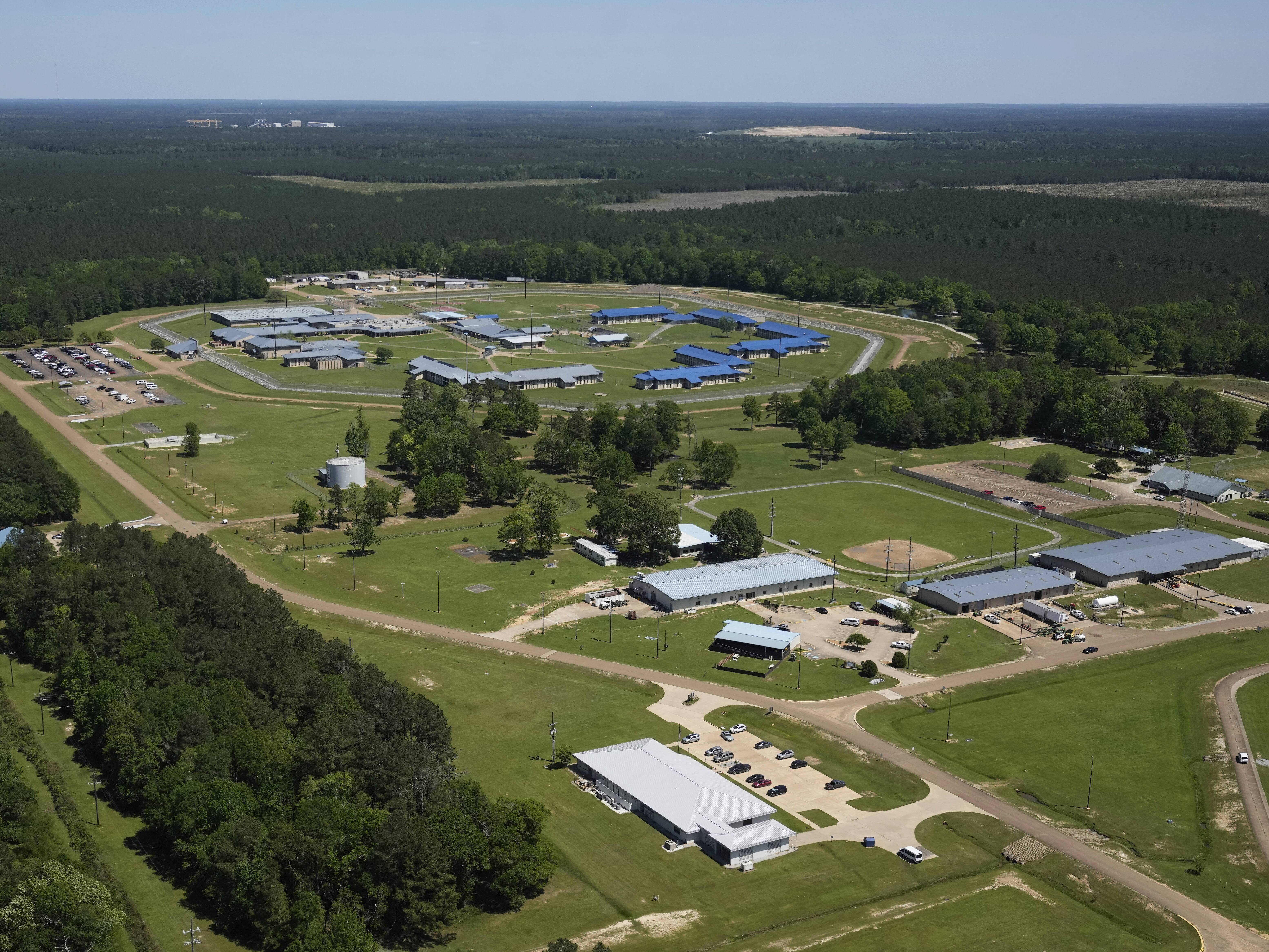 caption: The EOIR (Executive Office For Immigration Review) Oakdale Immigration Court, bottom, is seen in this aerial photo in Oakdale, La., Tuesday, April 8, 2025.