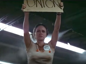 caption: Sally Field plays a cotton mill worker in the 1979 drama <em>Norma Rae.</em>
