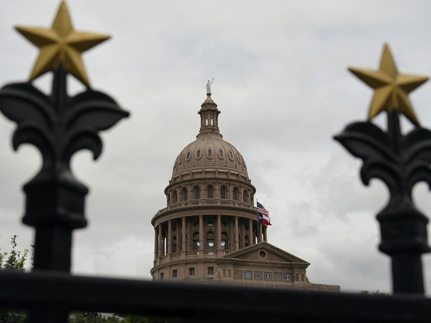caption: This June 1, 2021, file photo shows the State Capitol in Austin, Texas.