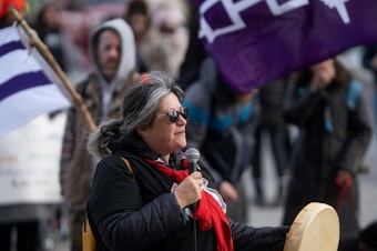 caption: Patty Krawec at a Wet'suwet'en solidarity event at the Canada-U.S. border.