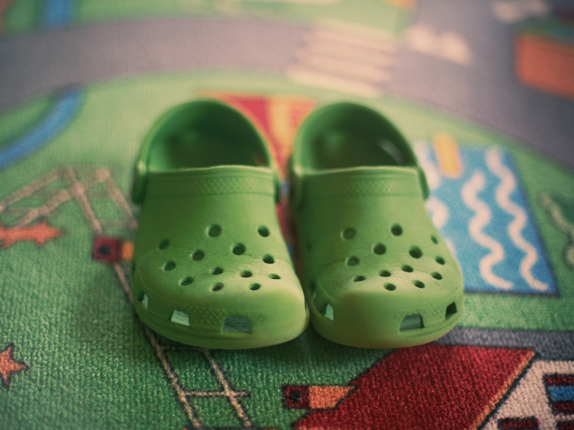 caption: Crocs are comfy, water-resistant shoes that are popular with kids, but some podiatrists say they should be alternated with sturdier footwear.