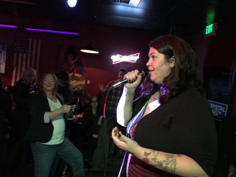 caption: Burien City Council candidate Krystal Marx speaks to supporters Tuesday night. Marx leads by just four votes against opponent, Patty Janssen.
