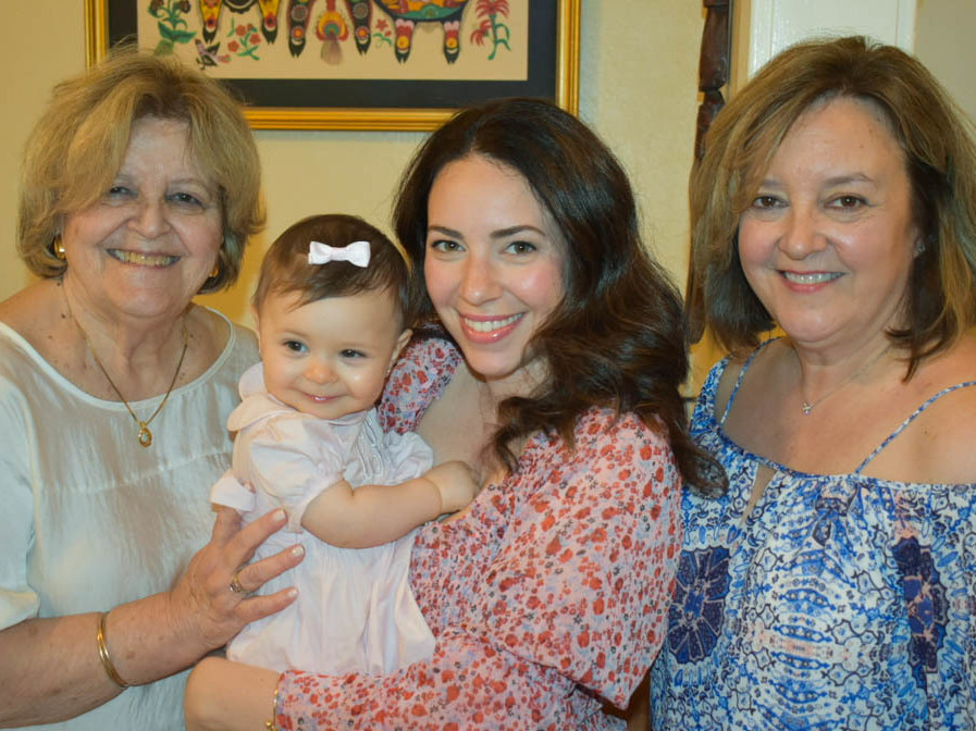 caption: Vivian Garcia Leonard (left); Marissa Sofia Ochs (middle), holding her daughter, Liana; and Vivian J. Leonard (right) talk about being pharmacists in New York, a city that has been especially hard hit during the coronavirus pandemic.