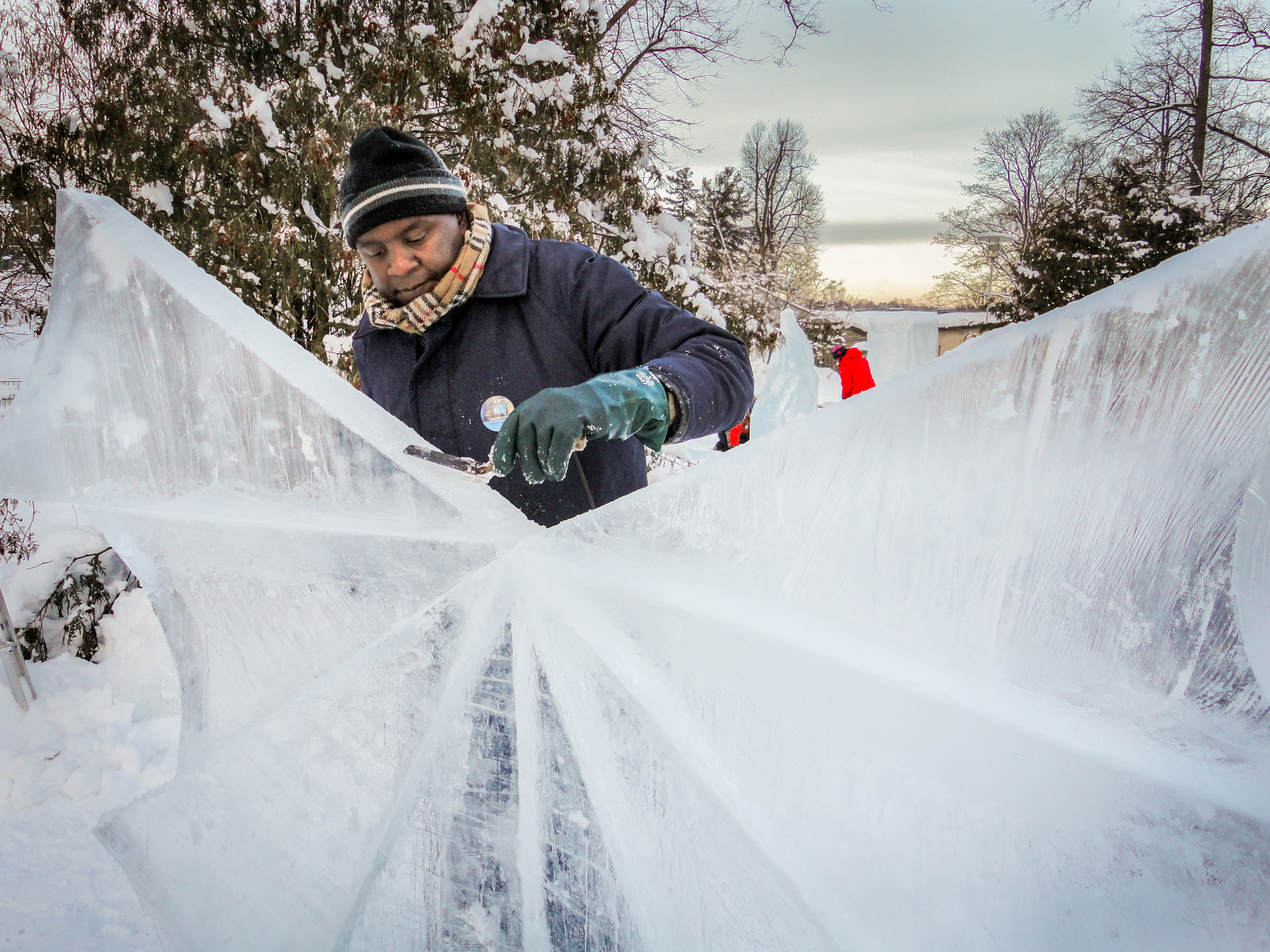 caption: After winning a prize in Quebec, Michael Kaloki went on to sculpt ice at other competitions, such as the Helsinki Zoo International Ice Carving Festival.