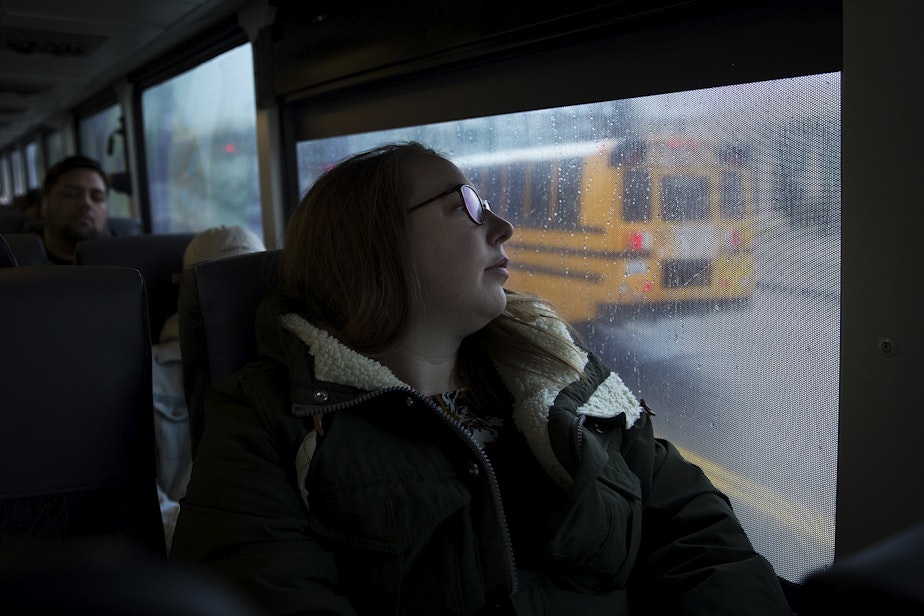 caption: Kara Peters commutes to her job at the Seattle Public Central Library on the 594 Sound Transit bus from Tacoma on Wednesday, January 22, 2020.