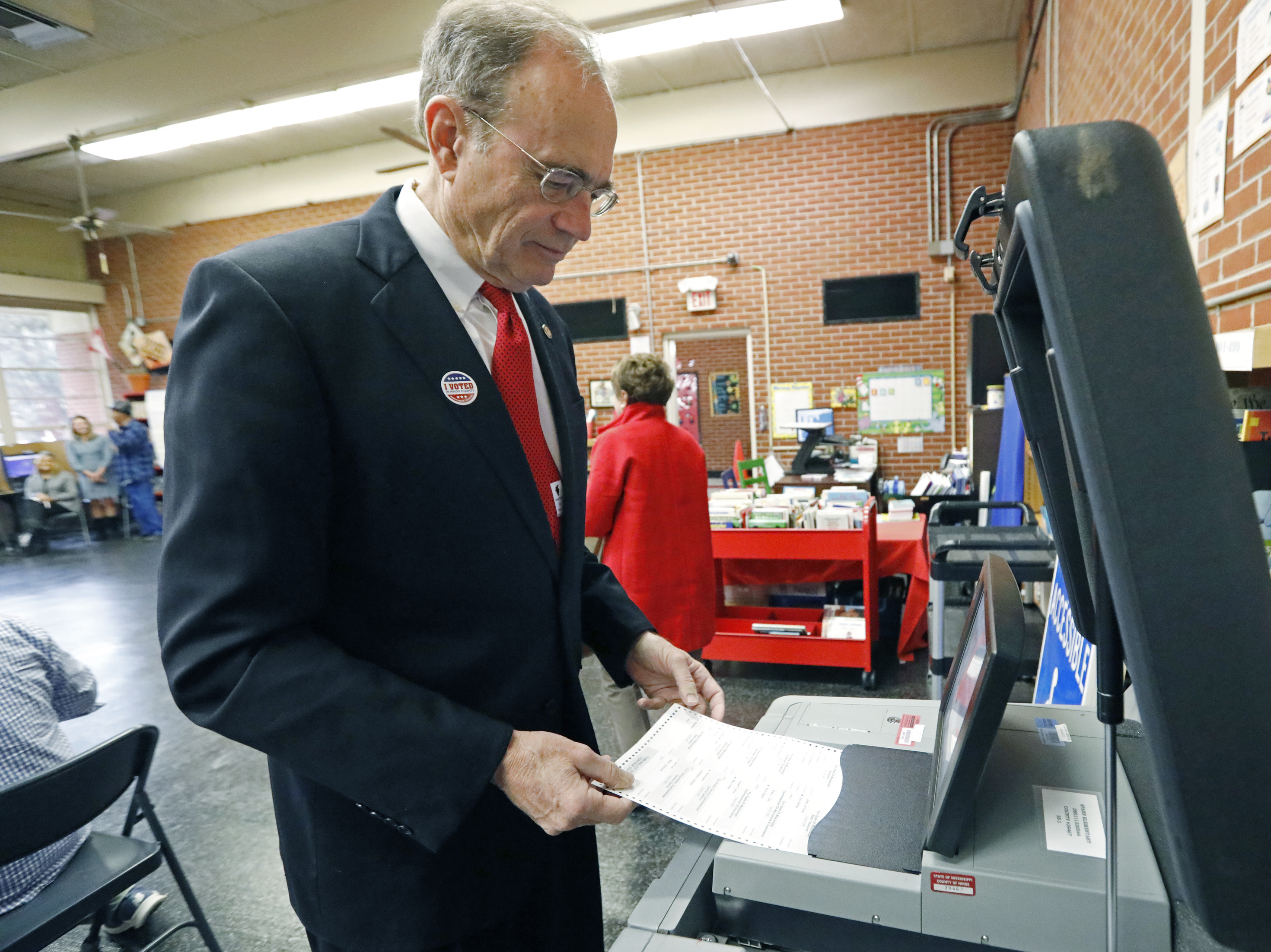 caption: Then-Secretary of State Delbert Hosemann electronically cast his ballot in Jackson, Miss., on Nov. 5, 2019.
