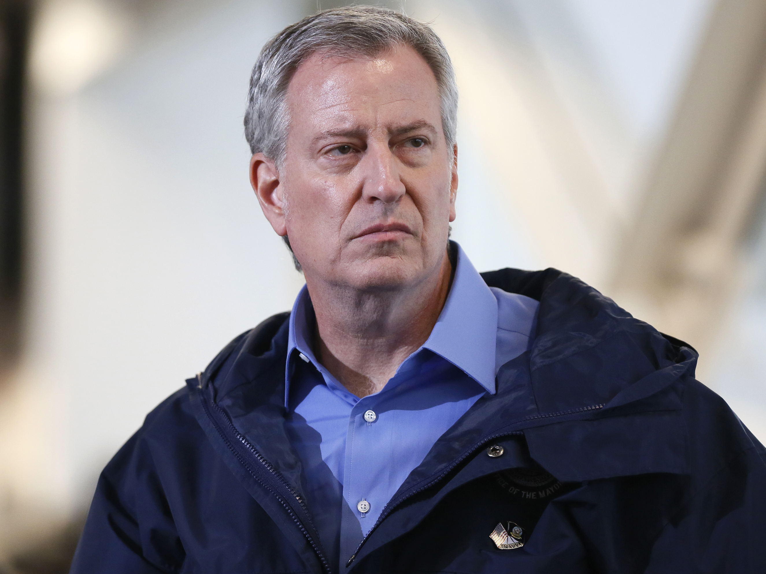 caption: New York City Mayor Bill de Blasio announced today that the NYPD will no longer require people to wear masks in public, unless the absence of a mask presents a "serious danger." He's seen here on March 31.