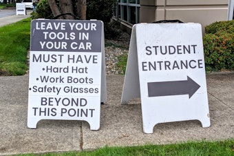 caption: Signs usher apprentices into the Northwest Carpenters Institute.