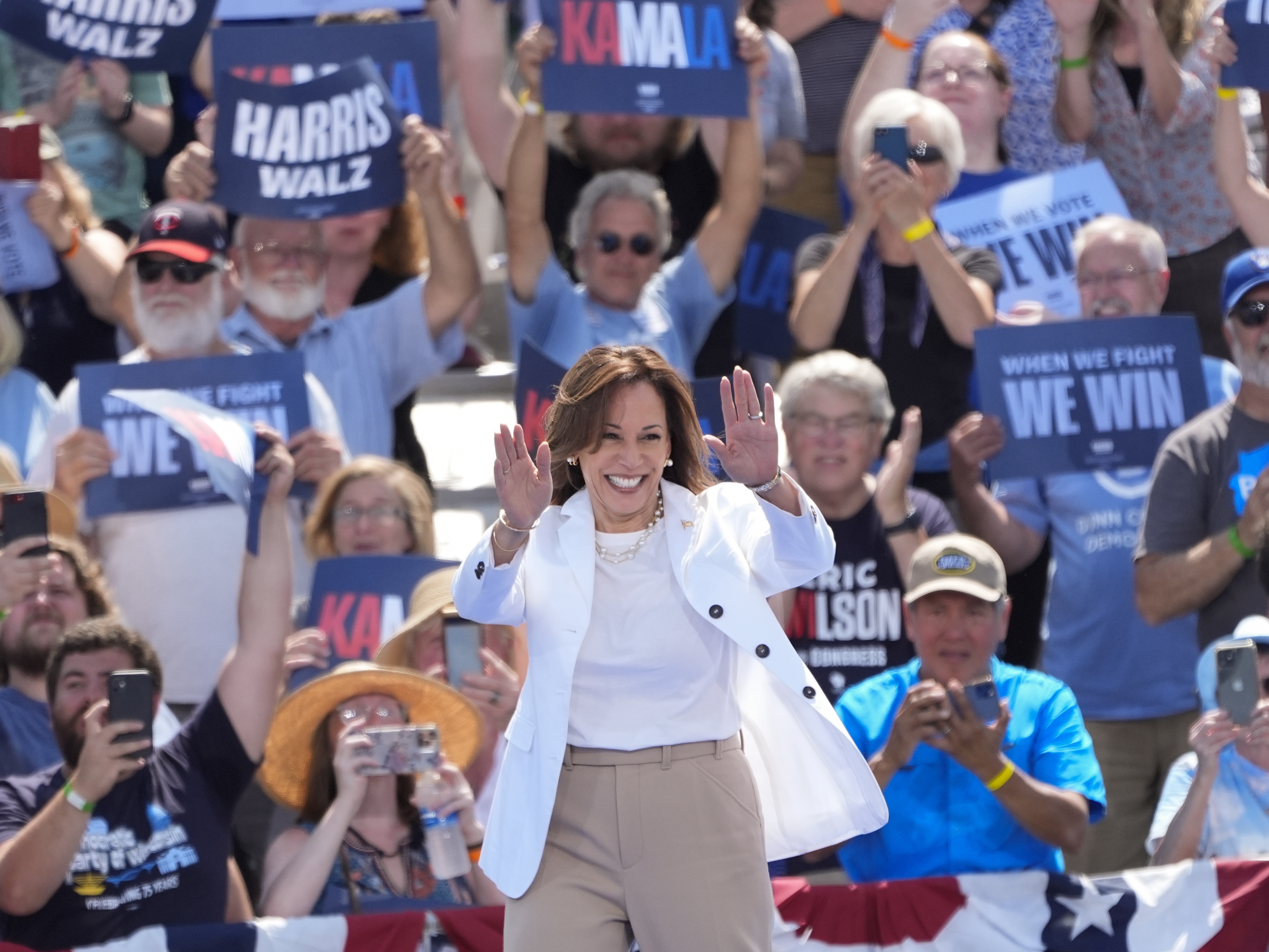 caption:  Democratic presidential nominee Vice President Kamala Harris arrives to deliver remarks at a campaign event, Wednesday, Aug. 7, 2024, in Eau Claire, Wisc.