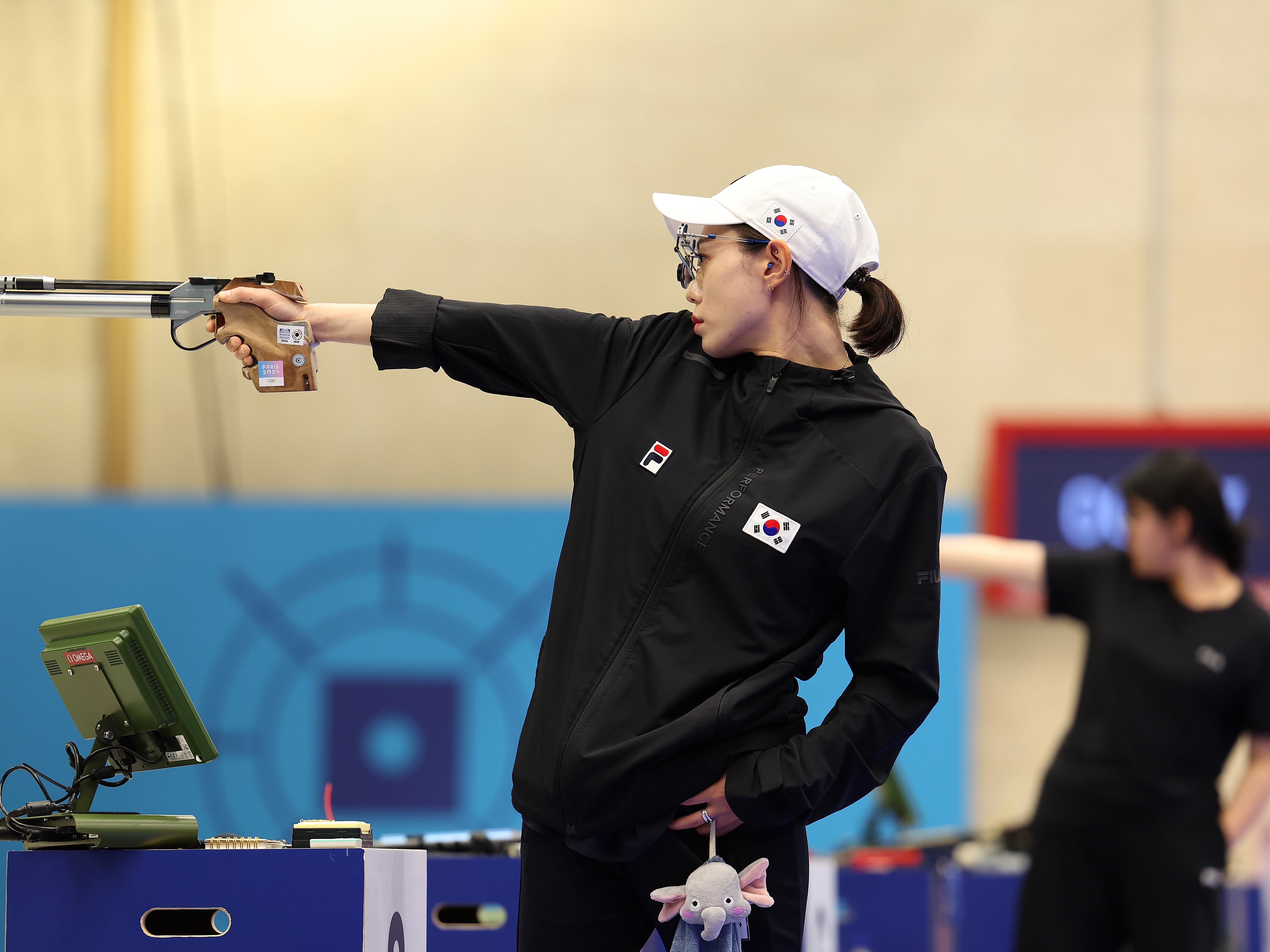 caption: Kim Yeji of Team Republic of Korea shoots during the Women’s 10m Air Pistol Final at the 2024 Paris Olympic Games, Chateauroux, France. <br>