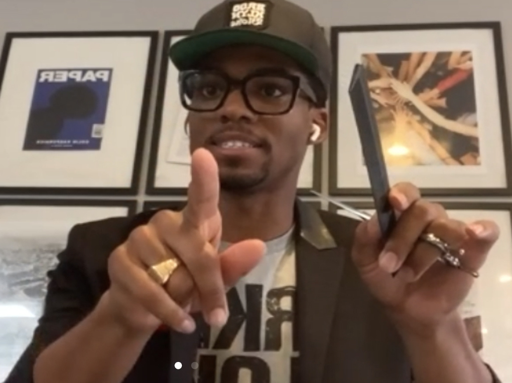 caption: JaBarie Anderson has led more than a hundred haircuts via Zoom in the last few weeks.